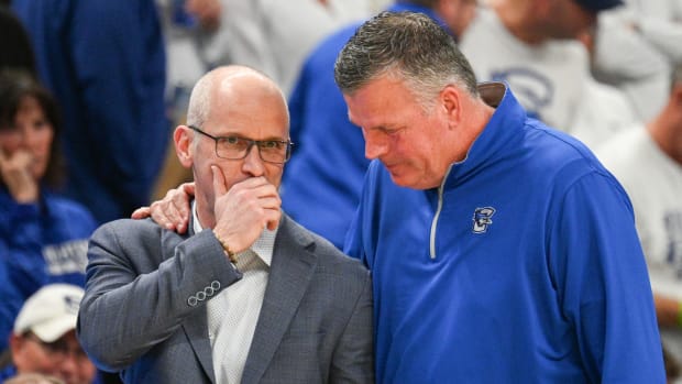 Creighton Bluejays head coach Greg McDermott and Connecticut Huskies head coach Dan Hurley meet before the game at CHI Health Center Omaha.